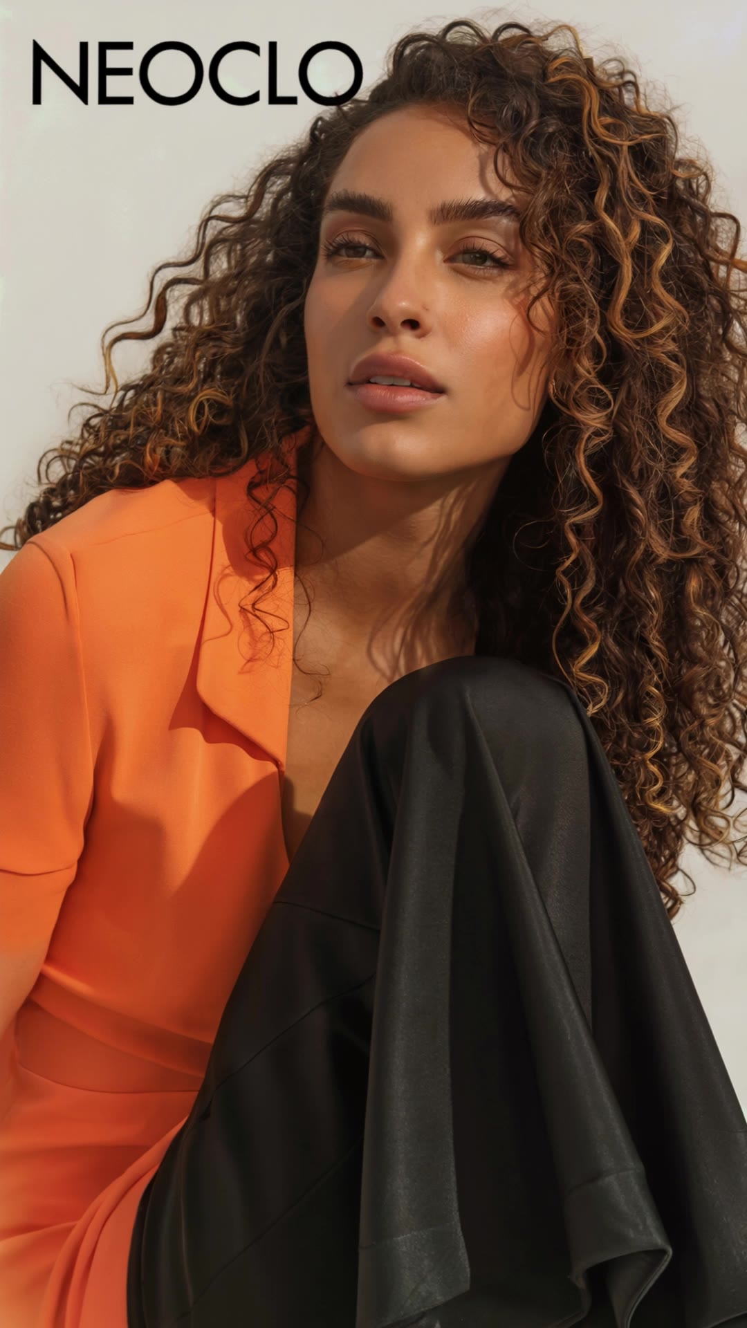A woman with voluminous curly ha - undercut hairstyle for curly hair AI video