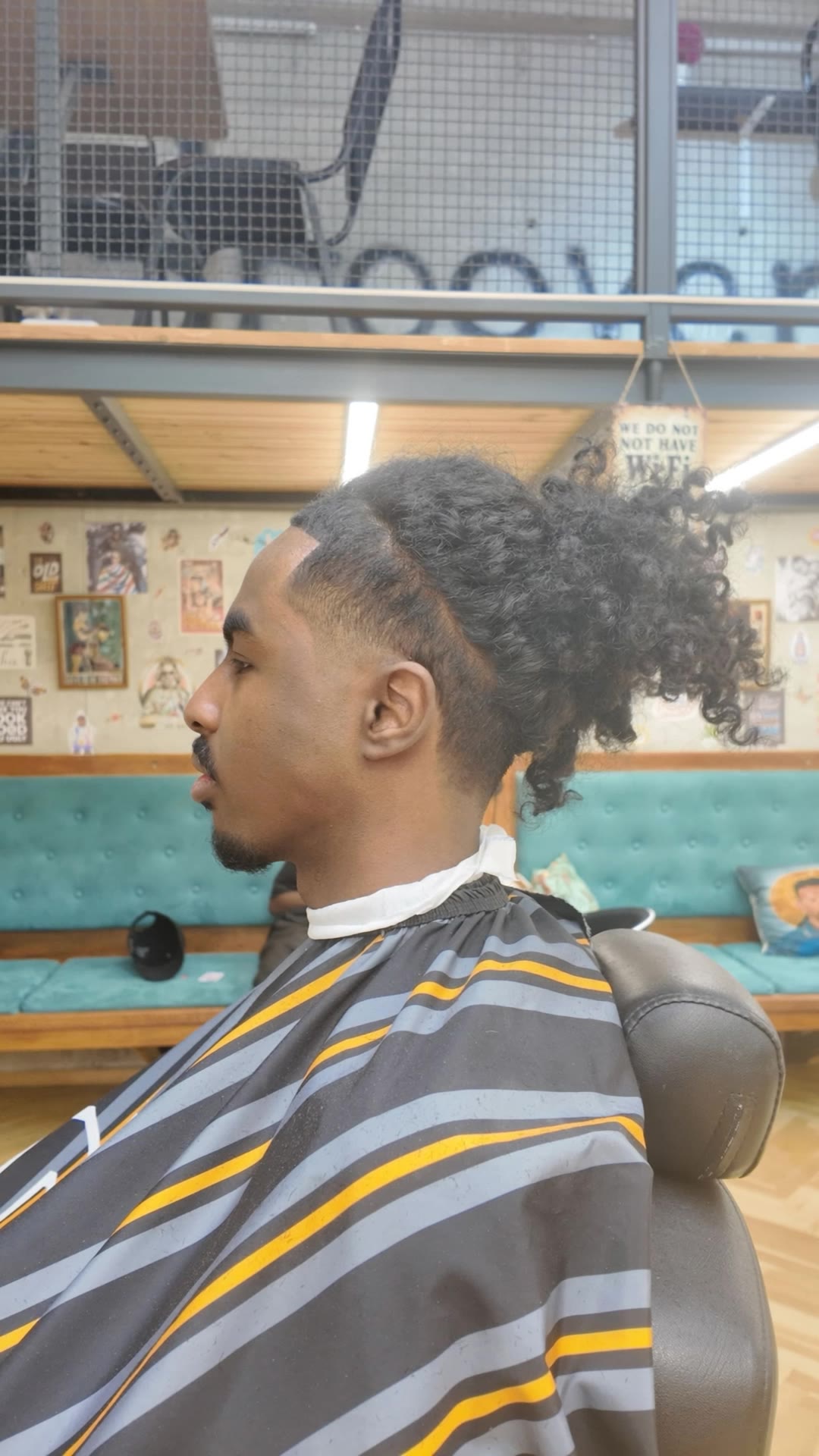 Kling AI work 315399444506743 - low taper fade with curly hair AI video